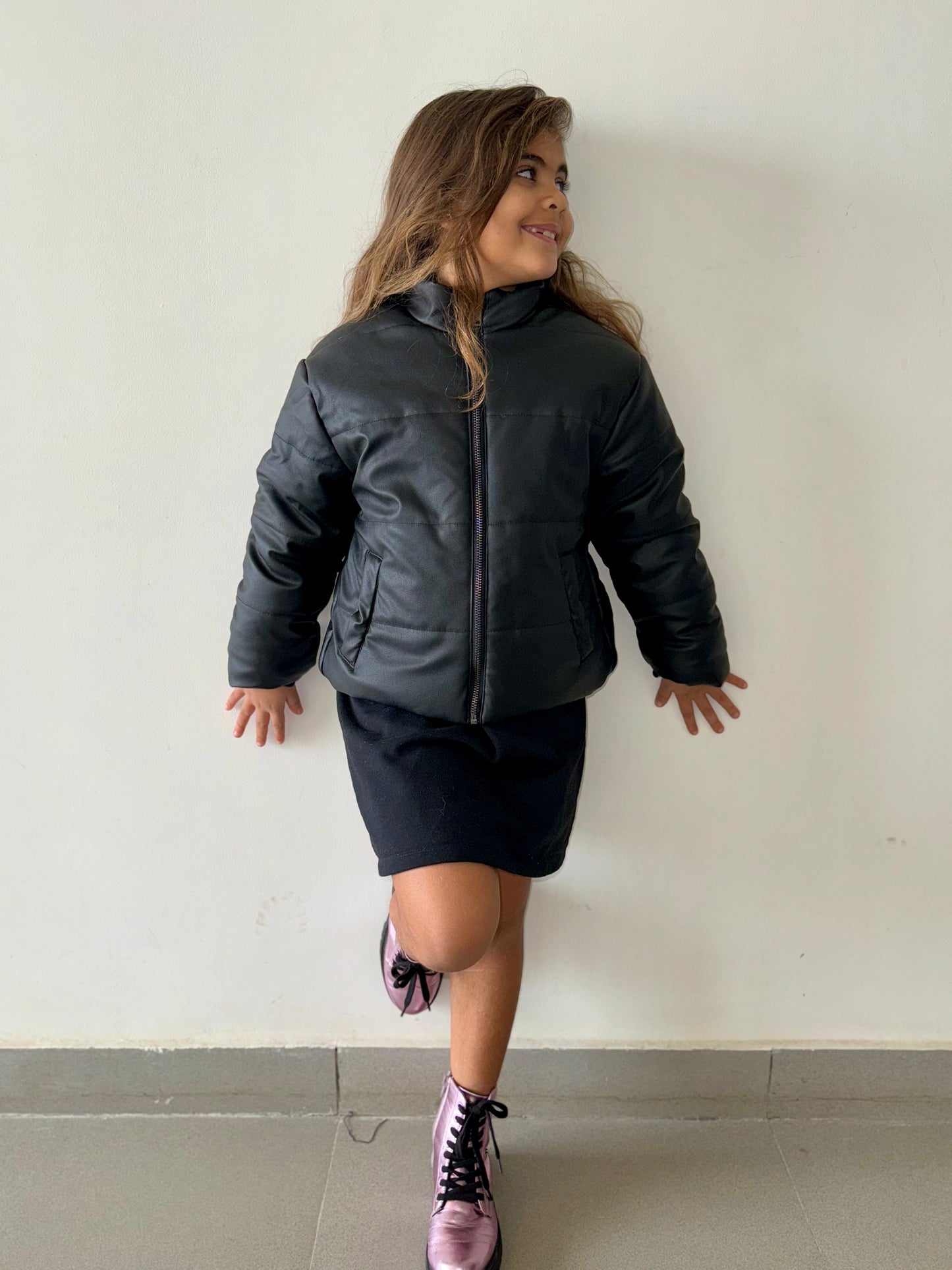 Black leather puffer jacket
