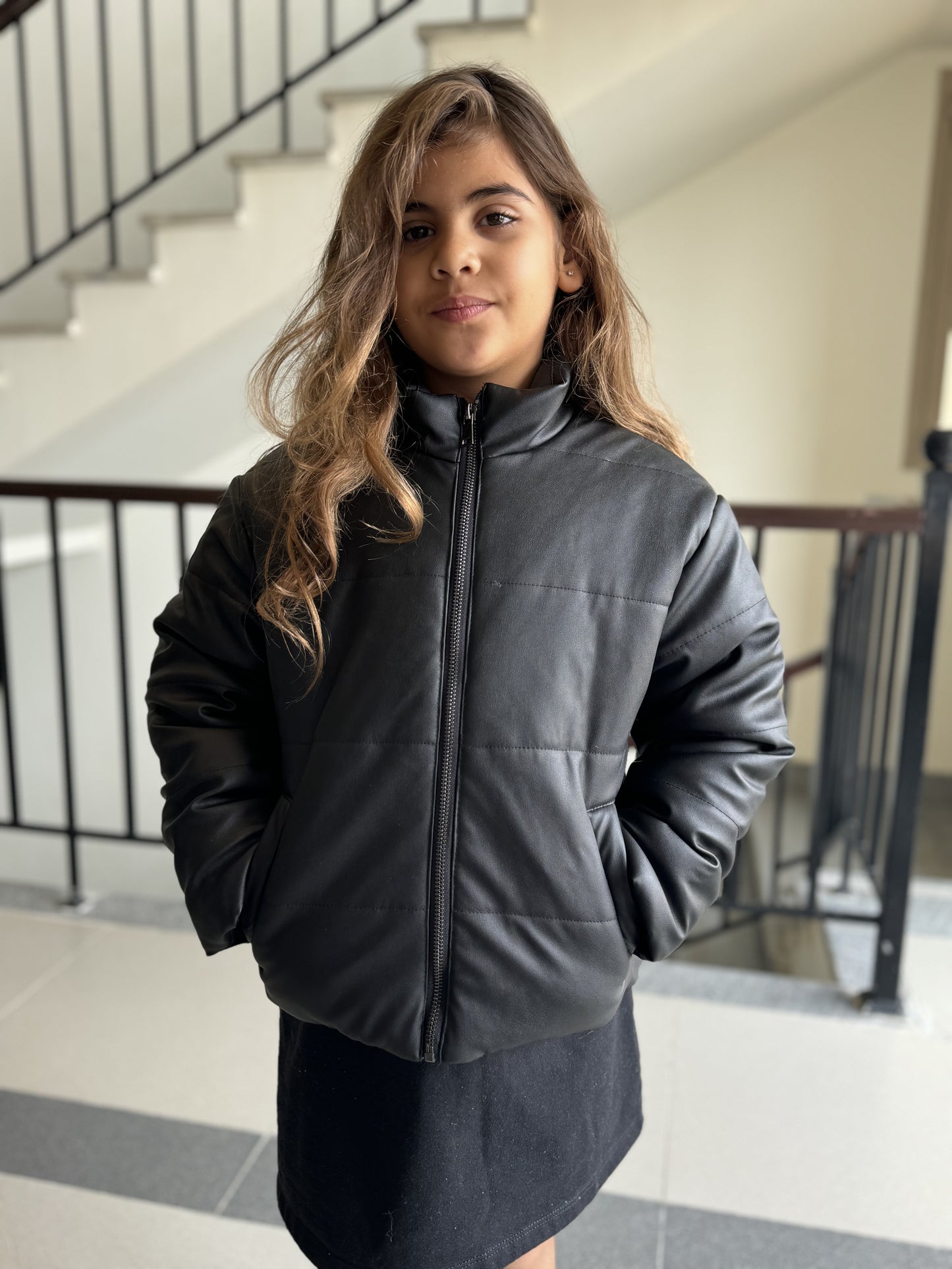 Black leather puffer jacket